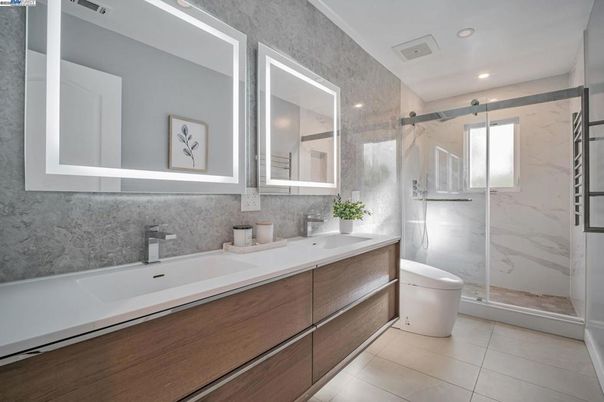 Bathroom, Dual Sink Vanities, Glass Shower, Interior, Marble Walls, Recessed Lighting