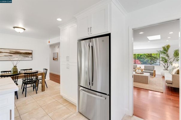 Dining room, Interior, Kitchen, Living room, Recessed Lighting, Stainless Steel Appliances, Wood Texture Flooring