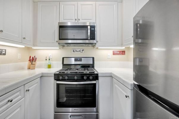 Interior, Kitchen, Stainless Steel Appliances, Tile Countertops