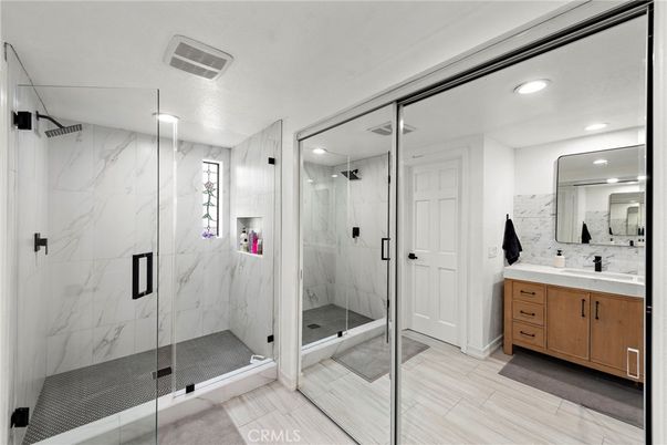 Bathroom, Glass Shower, Interior, Marble Walls, Recessed Lighting, Wood Texture Flooring