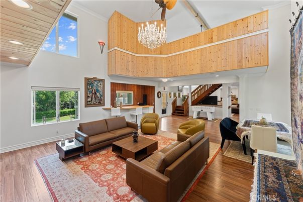 Chandelier, Interior, Living room, Piano, Recessed Lighting, Wooden Ceilings, Wood Texture Flooring