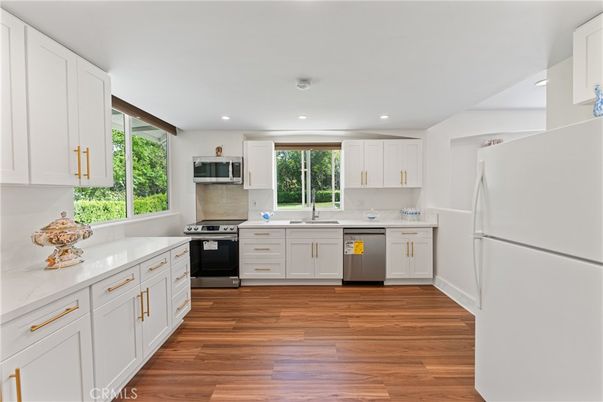 Interior, Kitchen, Recessed Lighting, Stainless Steel Appliances, Wood Texture Flooring