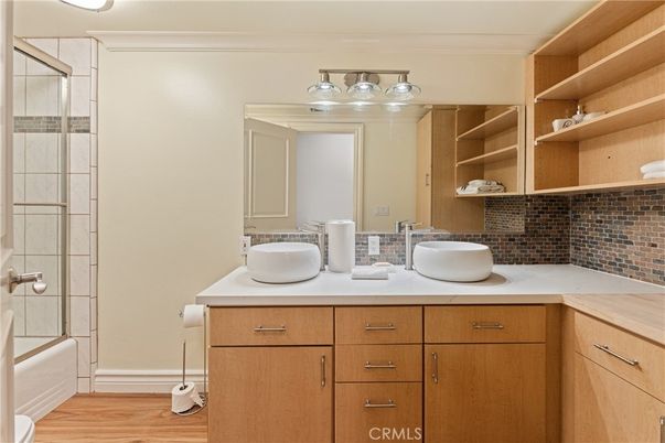 Bathroom, Dual Sink Vanities, Glass Shower, Interior, Wood Texture Flooring