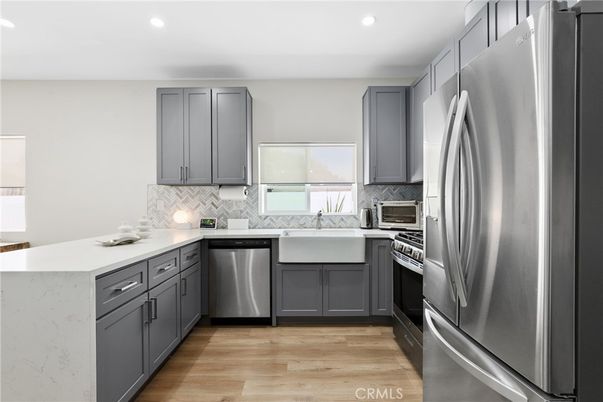 Interior, Kitchen, Recessed Lighting, Stainless Steel Appliances, Wood Texture Flooring