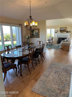 Chandelier, Dining room, Fireplace, Interior, Living room, Wood Texture Flooring