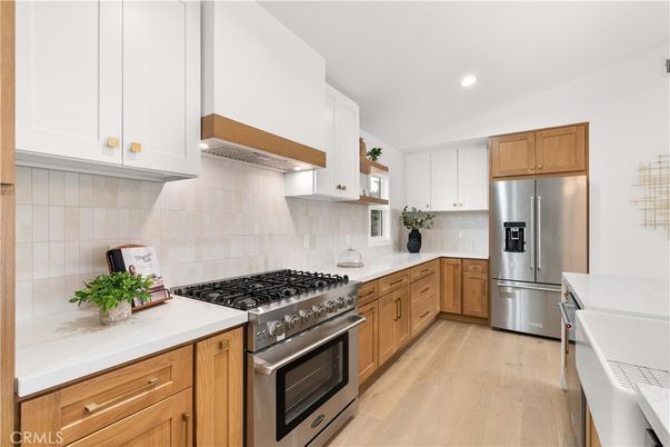Interior, Kitchen, Recessed Lighting, Stainless Steel Appliances, Tile Countertops, Wood Texture Flooring