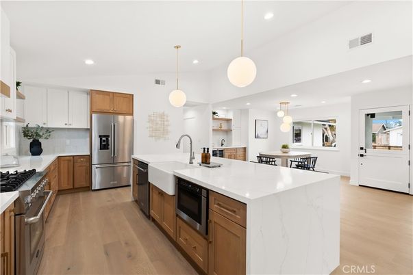 Dining room, Interior, Kitchen, Pendant Lights, Recessed Lighting, Stainless Steel Appliances, Wood Texture Flooring