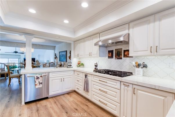 Dining room, Interior, Kitchen, Recessed Lighting, Stainless Steel Appliances, Wood Texture Flooring