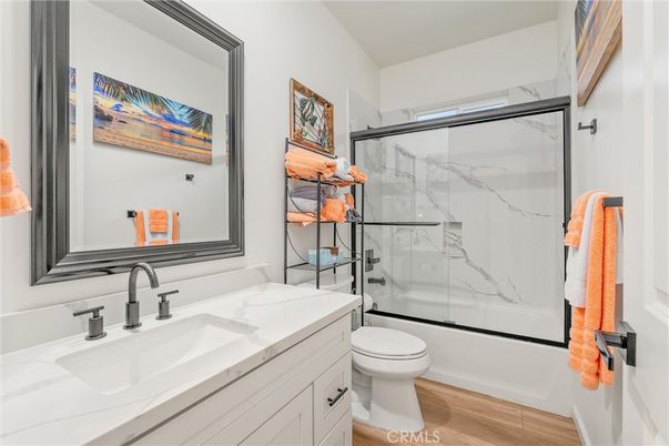 Bathroom, Glass Shower, Interior, Marble Walls, Wood Texture Flooring
