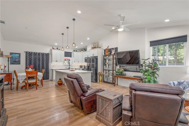 Dining room, Interior, Kitchen, Living room, Pendant Lights, Recessed Lighting, Stainless Steel Appliances, Wood Texture Flooring