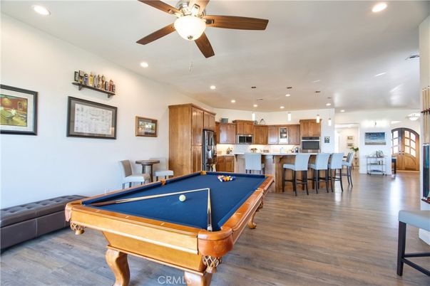 Billiard Table, Game Room, Interior, Kitchen, Pendant Lights, Recessed Lighting, Stainless Steel Appliances, Wood Texture Flooring