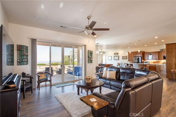 Dining room, Interior, Kitchen, Living room, Pendant Lights, Recessed Lighting, Stainless Steel Appliances, Wood Texture Flooring