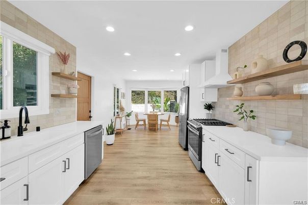 Dining room, Interior, Kitchen, Recessed Lighting, Stainless Steel Appliances, Wood Texture Flooring