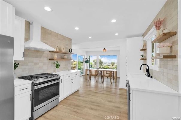 Dining room, Interior, Kitchen, Recessed Lighting, Stainless Steel Appliances, Wood Texture Flooring