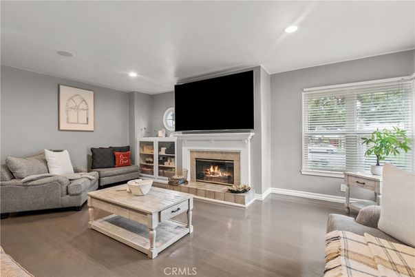 Fireplace, Interior, Living room, Recessed Lighting, Wood Texture Flooring