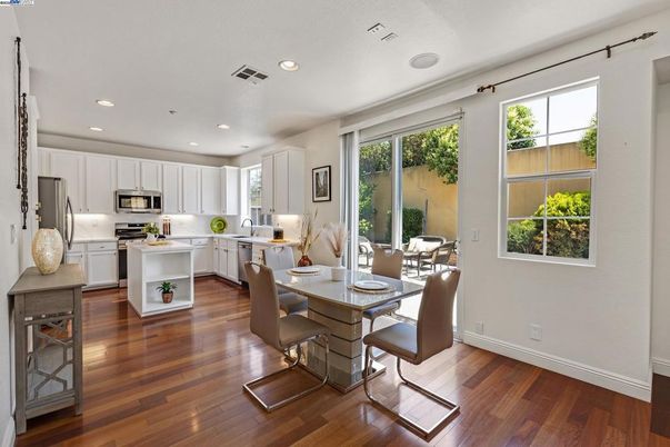 Dining room, Interior, Kitchen, Recessed Lighting, Stainless Steel Appliances, Wood Texture Flooring