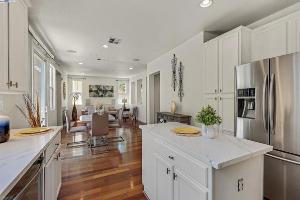 Dining room, Interior, Kitchen, Recessed Lighting, Stainless Steel Appliances, Wood Texture Flooring