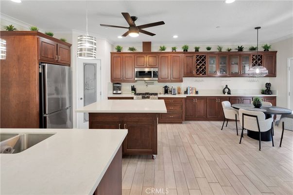 Dining room, Interior, Kitchen, Pendant Lights, Recessed Lighting, Stainless Steel Appliances, Wood Texture Flooring