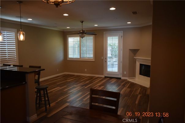 Empty room, Fireplace, Interior, Pendant Lights, Recessed Lighting, Wood Texture Flooring