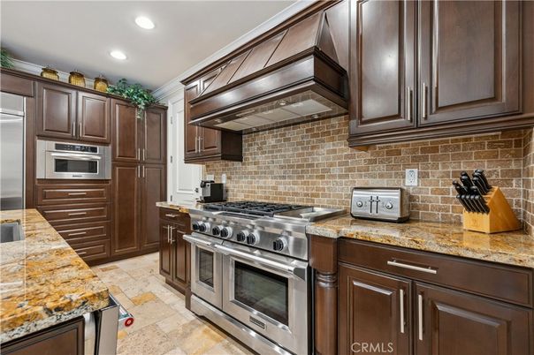 Interior, Kitchen, Recessed Lighting, Stainless Steel Appliances, Stone Walls