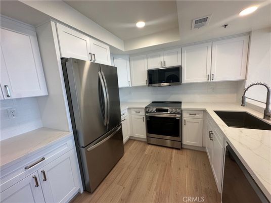 Interior, Kitchen, Recessed Lighting, Stainless Steel Appliances, Wood Texture Flooring