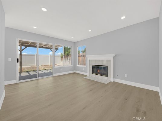 Empty room, Fireplace, Interior, Recessed Lighting, Wood Texture Flooring