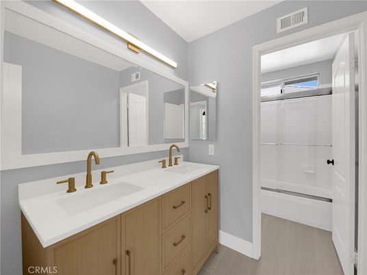 Bathroom, Dual Sink Vanities, Glass Shower, Interior, Wood Texture Flooring