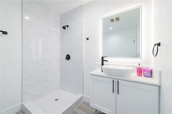 Bathroom, Interior, Marble Walls, Recessed Lighting, Wood Texture Flooring