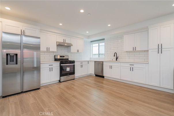 Interior, Kitchen, Recessed Lighting, Stainless Steel Appliances, Wood Texture Flooring