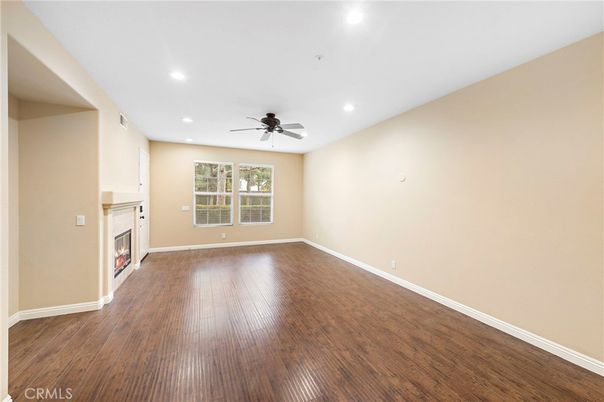 Empty room, Fireplace, Interior, Recessed Lighting, Wood Texture Flooring