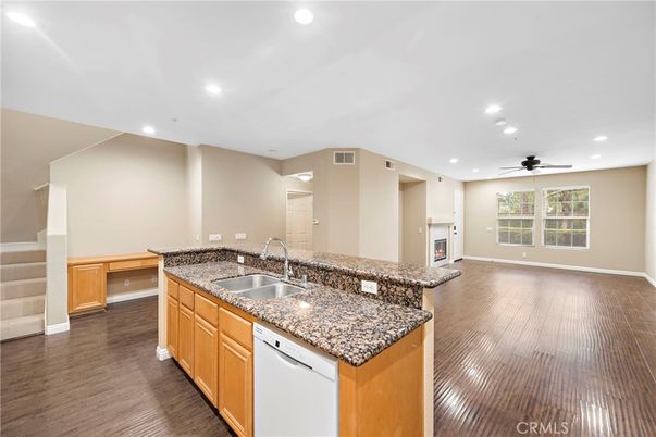 Fireplace, Interior, Kitchen, Recessed Lighting, Wood Texture Flooring