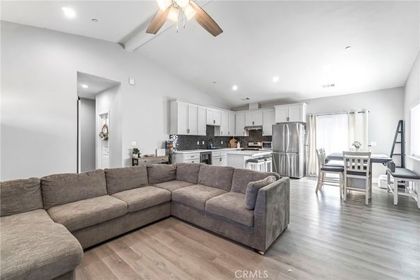 Dining room, Interior, Kitchen, Living room, Recessed Lighting, Stainless Steel Appliances, Wood Texture Flooring