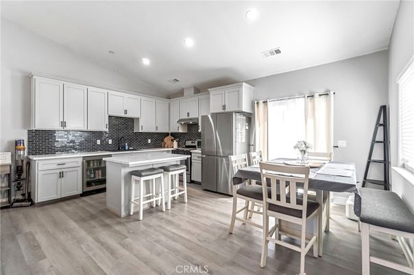 Dining room, Interior, Kitchen, Recessed Lighting, Stainless Steel Appliances, Wood Texture Flooring