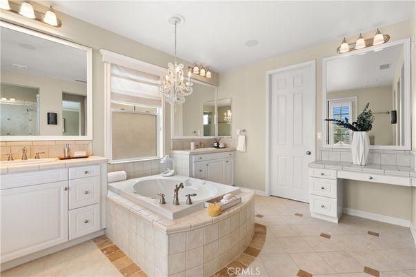 Bathroom, Chandelier, Dual Sink Vanities, Interior, Pendant Lights, Tile Countertops