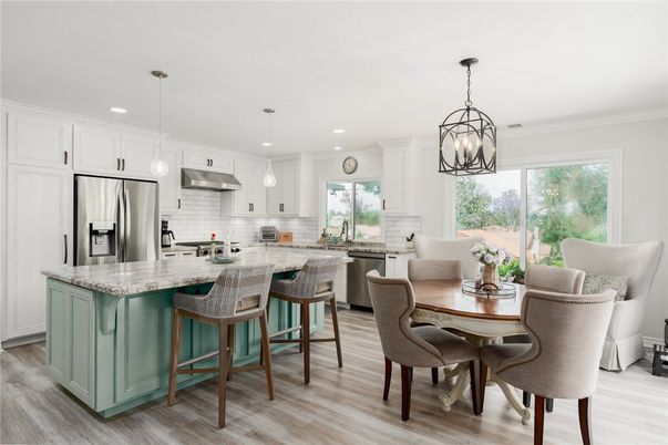 Chandelier, Dining room, Interior, Kitchen, Pendant Lights, Recessed Lighting, Stainless Steel Appliances, Wood Texture Flooring