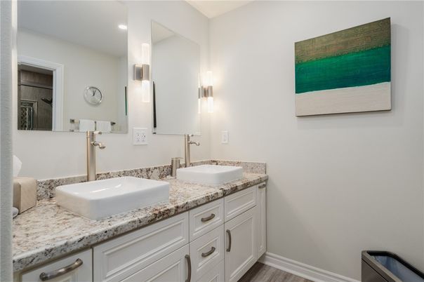 Bathroom, Dual Sink Vanities, Interior, Recessed Lighting, Wood Texture Flooring