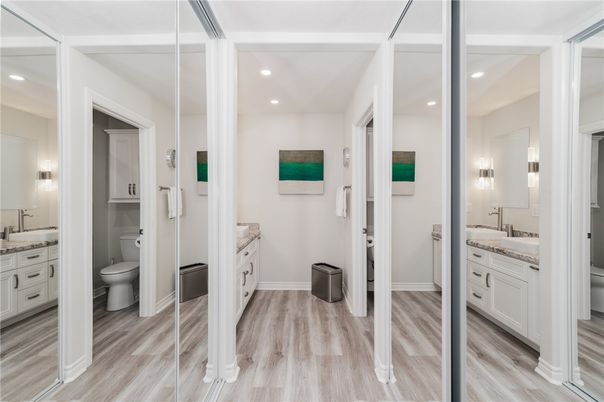Bathroom, Dual Sink Vanities, Interior, Recessed Lighting, Wood Texture Flooring
