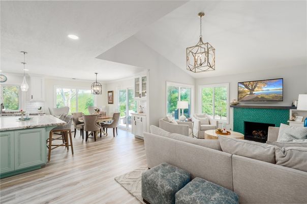 Chandelier, Dining room, Fireplace, Interior, Living room, Pendant Lights, Recessed Lighting, Wood Texture Flooring