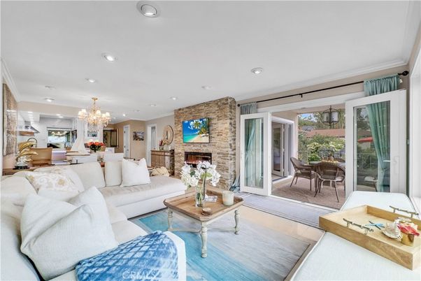 Chandelier, Dining room, Fireplace, Interior, Living room, Recessed Lighting, Stone Walls