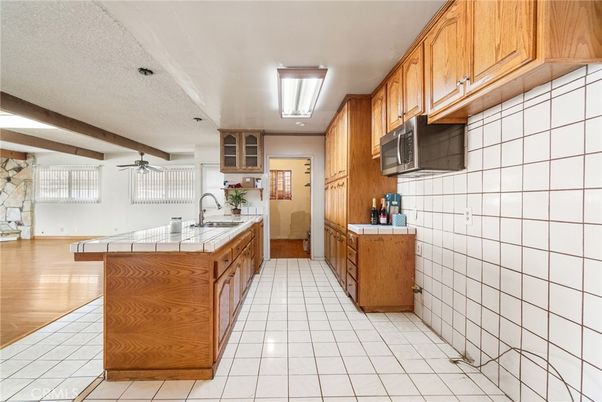 Interior, Kitchen, Tile Countertops, Wood Texture Flooring
