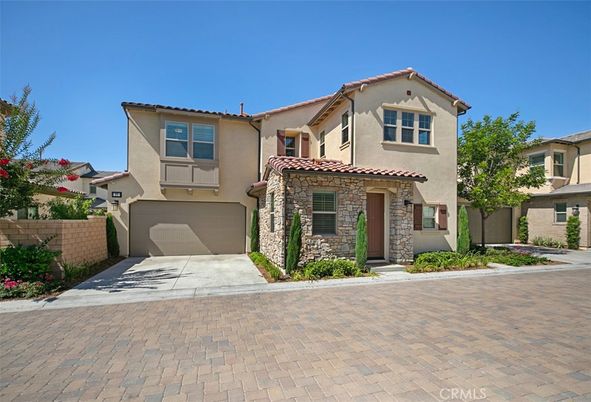 Attached, Exterior, Facade, Mediterranean