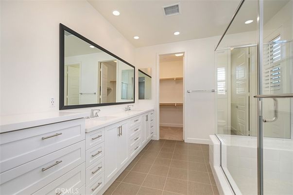 Bathroom, Dual Sink Vanities, Glass Shower, Interior, Recessed Lighting, Walk-in Closets