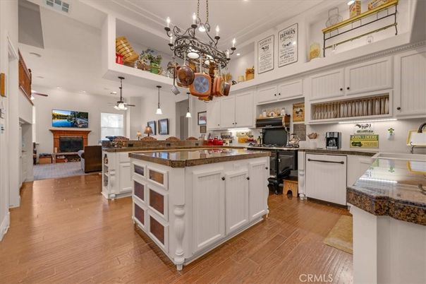 Chandelier, Dining room, Fireplace, Interior, Kitchen, Pendant Lights, Recessed Lighting, Wood Texture Flooring