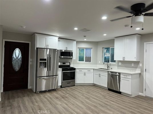 Interior, Kitchen, Recessed Lighting, Stainless Steel Appliances, Wood Texture Flooring