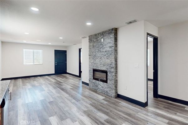 Empty room, Fireplace, Interior, Recessed Lighting, Wood Texture Flooring