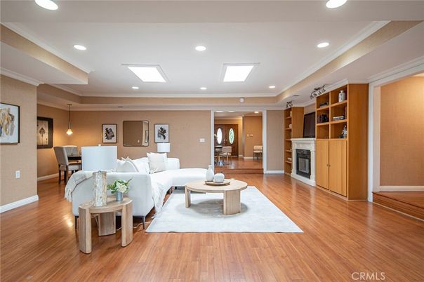 Dining room, Fireplace, Interior, Living room, Pendant Lights, Recessed Lighting, Wood Texture Flooring
