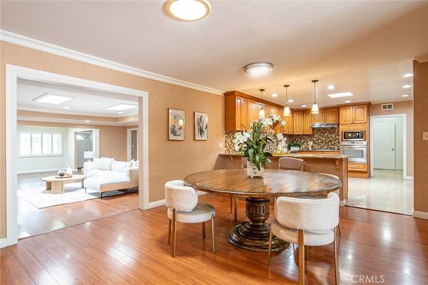 Dining room, Interior, Kitchen, Living room, Pendant Lights, Recessed Lighting, Stainless Steel Appliances, Wood Texture Flooring