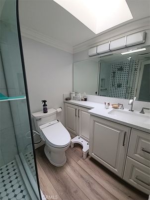 Bathroom, Dual Sink Vanities, Glass Shower, Interior, Wood Texture Flooring