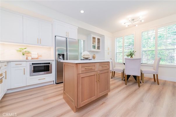 Dining room, Interior, Kitchen, Recessed Lighting, Stainless Steel Appliances, Wood Texture Flooring