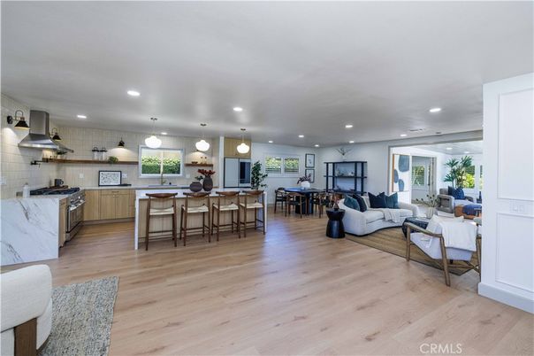 Dining room, Interior, Kitchen, Living room, Pendant Lights, Recessed Lighting, Stainless Steel Appliances, Wood Texture Flooring